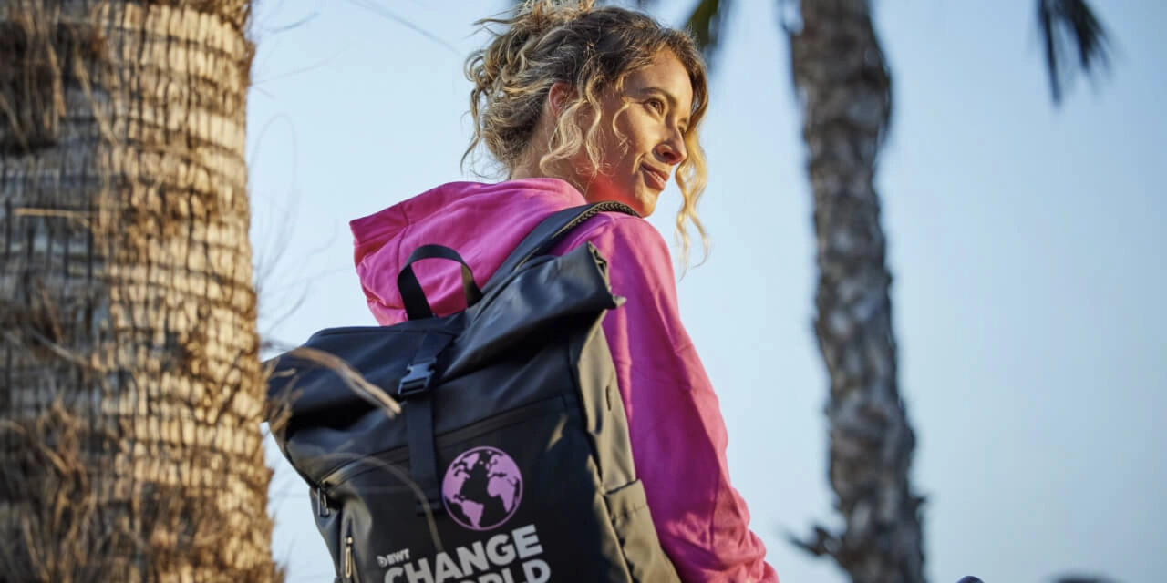 Woman with BWT backpack and BWT bottle