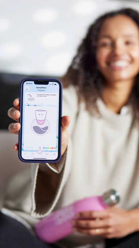 BWT App Woman with Mobile Phone and BWT Drinking Bottle