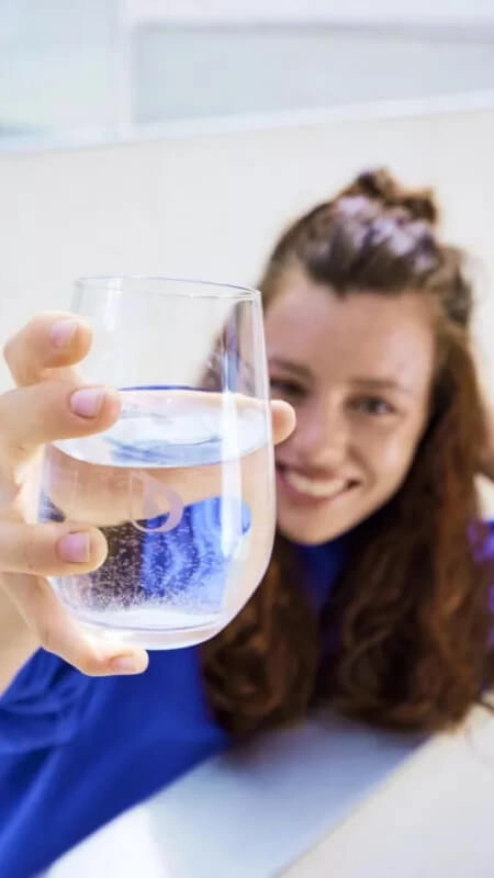 Woman with BWT Drinking Glass