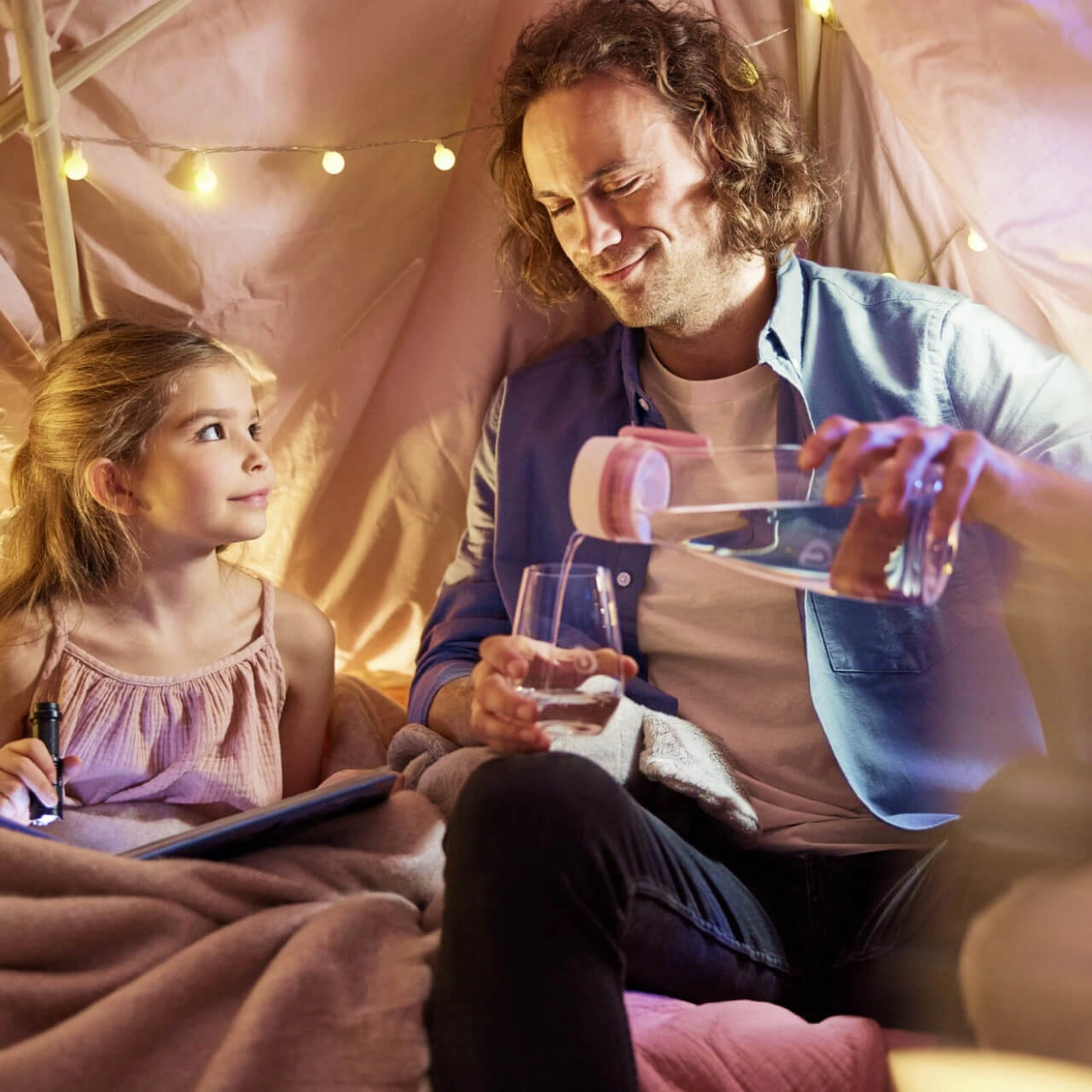 Man and child drinking BWT water